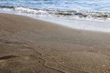 Black magnetic sand beach of Black sea in Ureki, Georgia