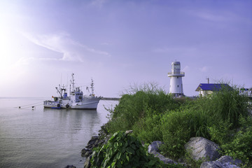 The Boat and Lighthouse 