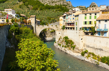 Fototapeta na wymiar A medieval village, Entrevaux is very picturesque, in a raised position above a bend in the river Var, and surrounded by the slopes of the lower provencal mountains.