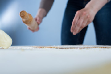 cook preparing dough for  bread