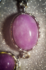 Silver jewellery with purple stone