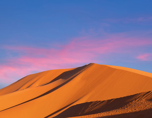 Fototapeta na wymiar Sand dunes in Sahara desert in Morocco, Africa