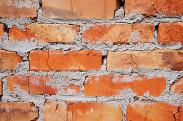 old brick wall with sloppy brickwork