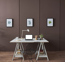comfortable workplace office table and laptop at office
