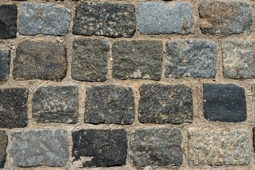 Old paving and square stones - retro background