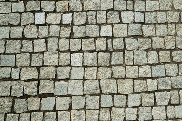 Old paving and square stones - retro background
