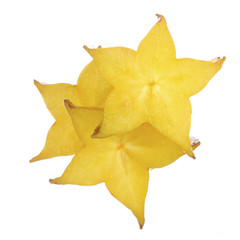 Fototapeta premium heap of slices of yellow starfruit (carambola) isolated