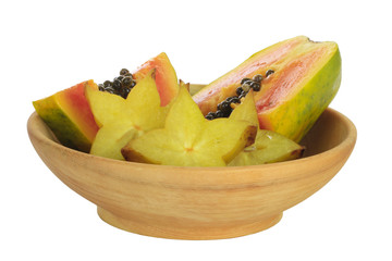 slices of carambola and pawpaw isolated on white background