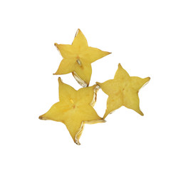 Fototapeta premium heap of slices of yellow starfruit (carambola) isolated