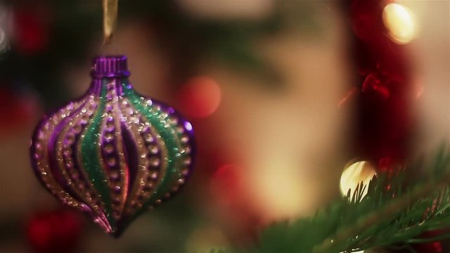 Christmas decoration stars toys rotating on blinking bokeh background.
