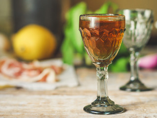 alcohol drink in a glass on a wooden table (wine) - drink berry cuisine.  Food background