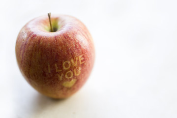 I love you caption on an apple