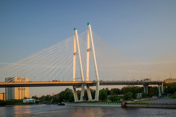 Obraz premium Cable-stayed bridge on the Neva river in St. Petersburg in the sunset.