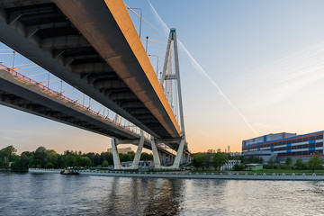 Cable-stayed bridge on the Neva river in St. Petersburg in the sunset.