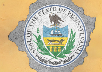 US state Pennsylvania seal flag in big concrete cracked hole and broken material facade structure