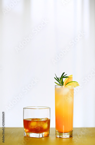 A Single Whiskey And Paloma Cocktail On The Center Of Copper