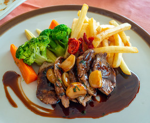 Port steak with red wine sauce