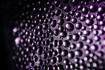 Texture of water drops on bottle