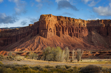 Red Rock Sandstone Formations in Torrey, Utah. Capitol Reef National Park is primarily made up of sandstone formations within the Waterpocket Fold, monocline that extends nearly 100 miles.