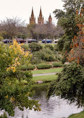View of public park in Adelaide, Australia, and St Peter's Cathedral towers in the distance.