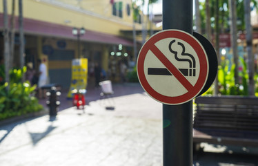 Label no smoking metal sign in the city
