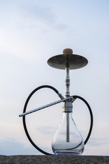 Hookah shisha smoke on beach background