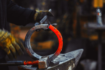 blacksmith working on an anvil