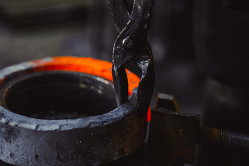 blacksmith working on an anvil