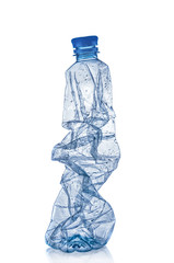 Wrinkled plastiic bottle isolated on white background