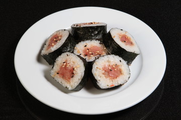 Sushi rolls served on a plate