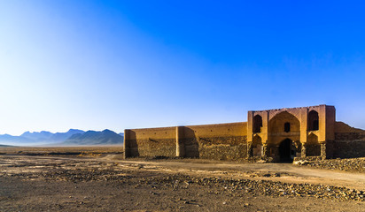 Abonded caravansarai in the desert by Varzaneh - Iran