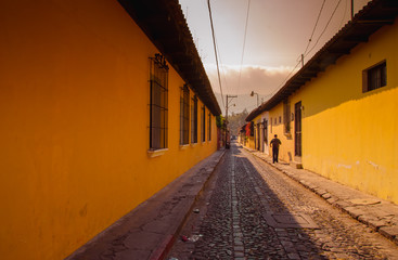 Outdoor view of stoned street with some old building houses and the historic city Antigua is UNESCO World Heritage Site since 1979