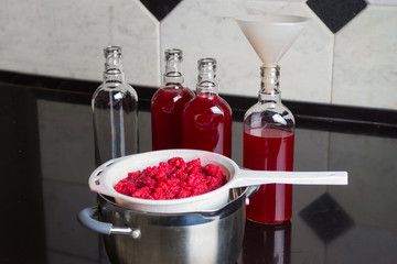 Healthy raspberries liqueur made of alcohol and fruits