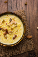 Rice pudding OR Kheer from India called also called Firnee. served in a bowl. Selective focus