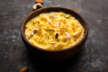 Rice pudding OR Kheer from India called also called Firnee. served in a bowl. Selective focus