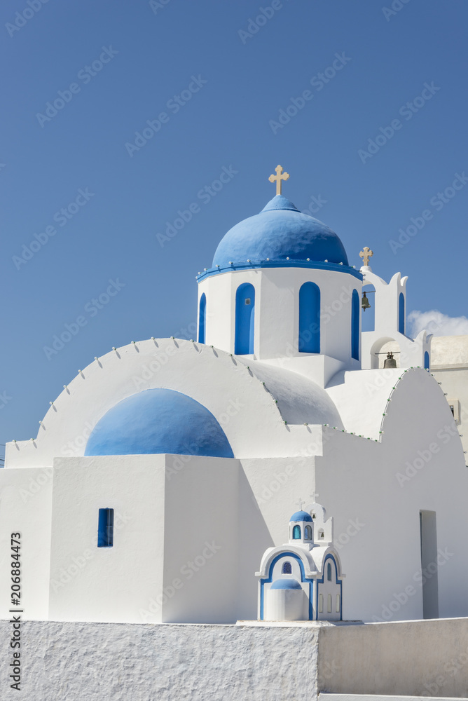 Wall mural orthodox church in santorini island, greece