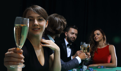 young beautiful woman playing in casino
