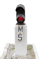 Traffic light shows red signal on white