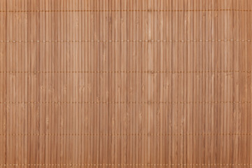 Background on the whole image of the bamboo mat light color. Horizontally located.