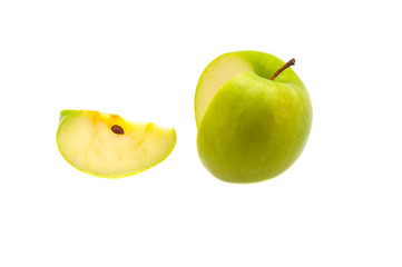 A single slice of a large green apple was cut off. On a white background. Isolated.