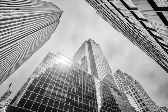 Fototapeta Looking up at Manhattan skyscrapers, New York City, USA.