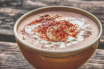 Cup Hot chocolate on an old wood plank