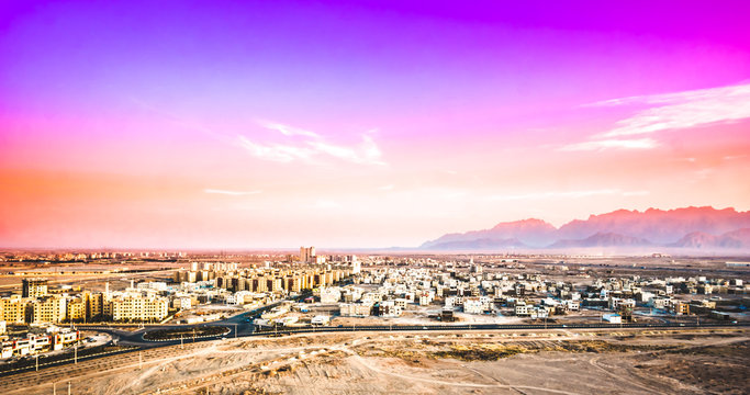 Purple sunset over cityscape of Yazd in Iran