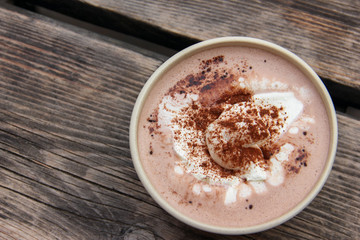 Cup Hot chocolate on an old wood plank