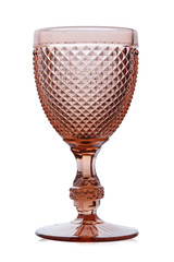 beautiful empty pink wine glass. the shape of the glass is reminiscent of old-fashioned textured dishes. isolated on white background. clipping path.