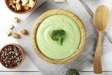 broccoli cream soup in a wooden plate