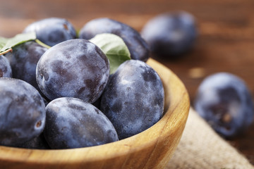 ripe plums in a plate