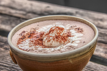 Cup Hot chocolate on an old wood plank