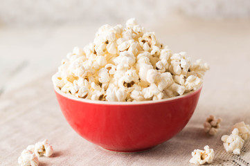 Popcorn in red bowl an easy snack during a day