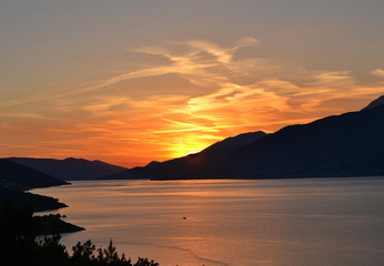 Beautiful sunset, mountains, sea Montenegro